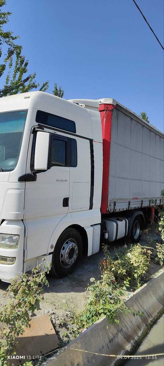 Тягач MAN TGX  2011 йил, автомат КПП, прицеп фрейхауф саф мост, 2009 й