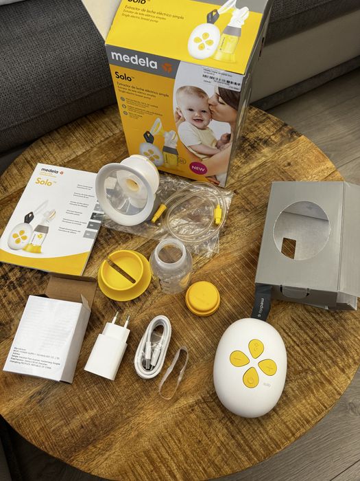 Medela Solo - Двуфазна електрическа помпа за кърма + шише и фуния