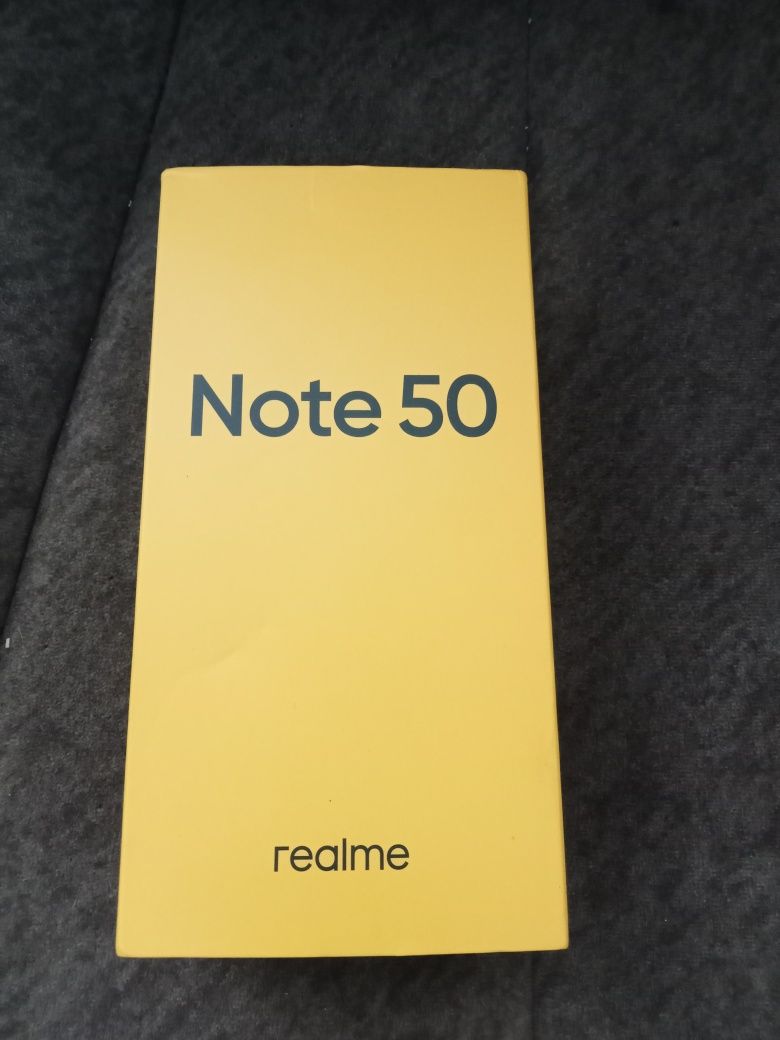 Продам новый телефон realme c50