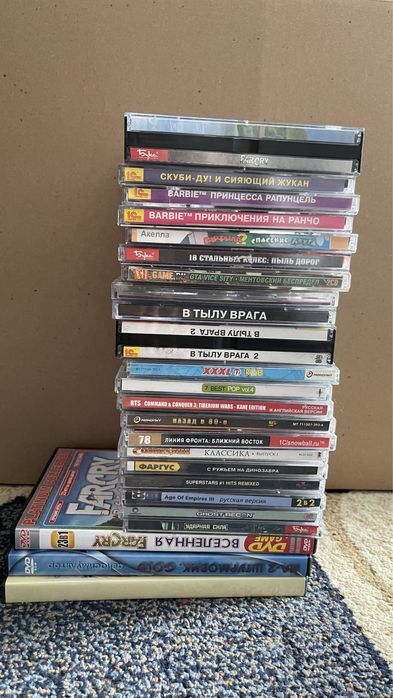 диски с музыкой и играми (гарфилд, барби, farcry и другие)