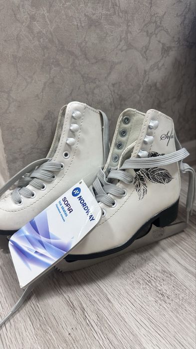 Продам коньки новые р.27