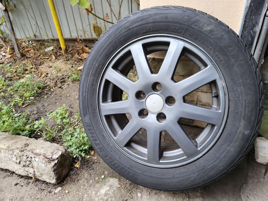 4 buc.Jante aliaj Ford Focus + cauciucuri iarnă Bridgestone 205/55 R16