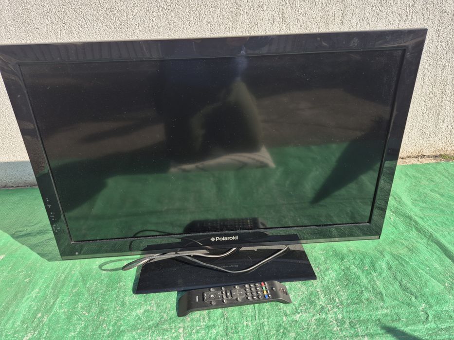 Vând tv color marca Polaroid model de 80cm cu telecomanda