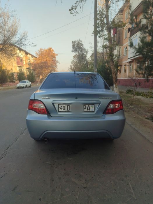 Нексия 2  Сонс гибрит матор лукс-кандисанер 2014 йил 320минг юргани  к