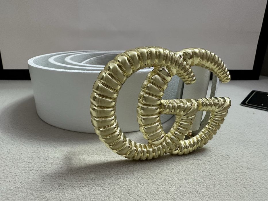 Колан Gucci.