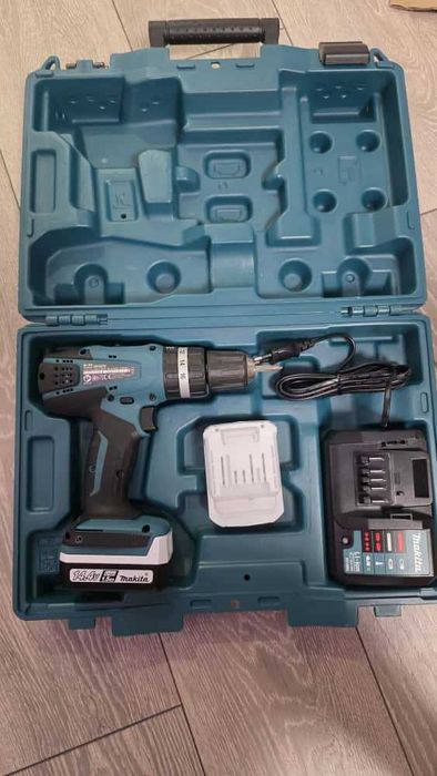 Masina de gaurit / insurubat cu percutie Makita HP347DWE