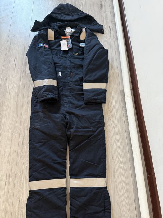 Продам новый утепленный комбинезон