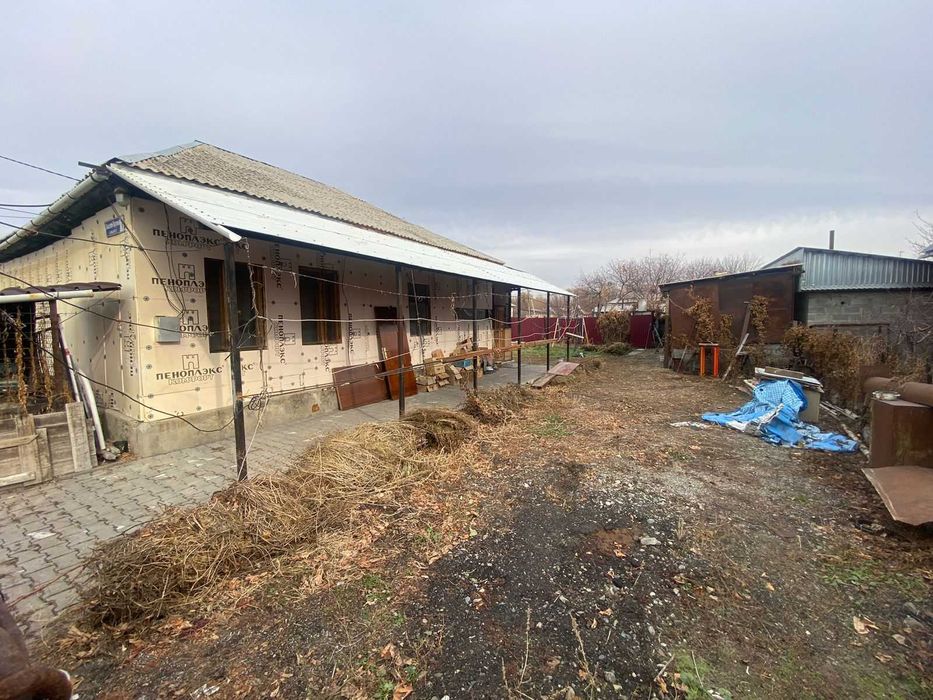 Дом, улица Калиева, Танат Империя