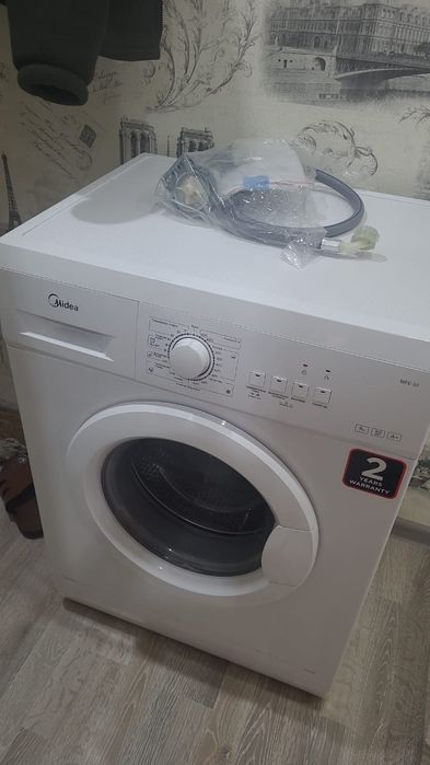 стиральная машины Midea