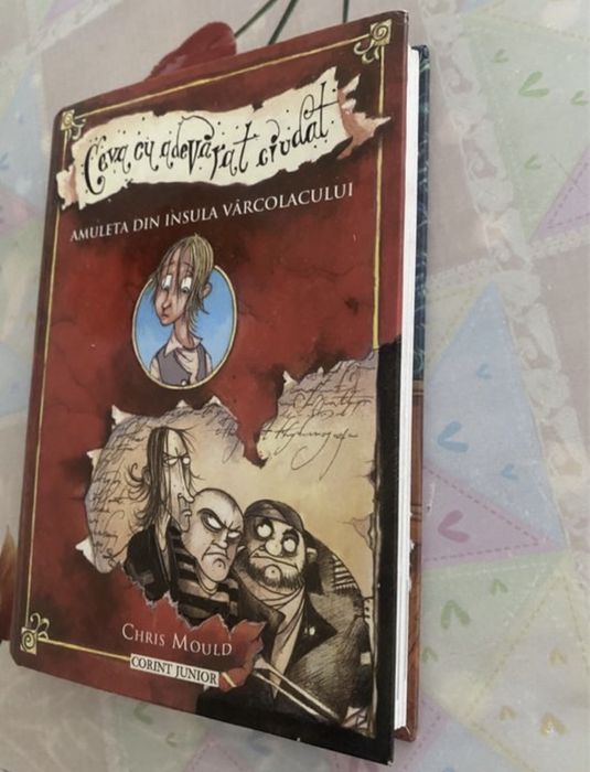 Chris Mould-Amuleta din insula vârcolacului.