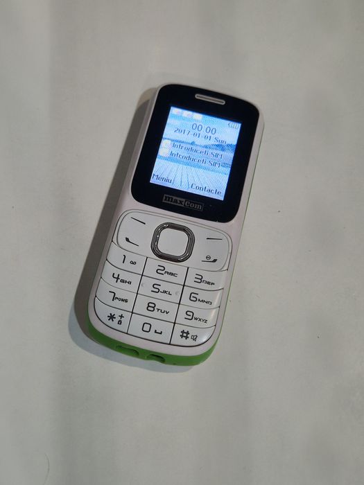 Telefon cu butoane cu încărcător