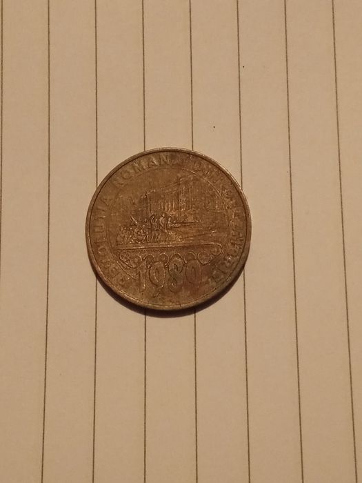 Vând moneda de la revoluția din 89
