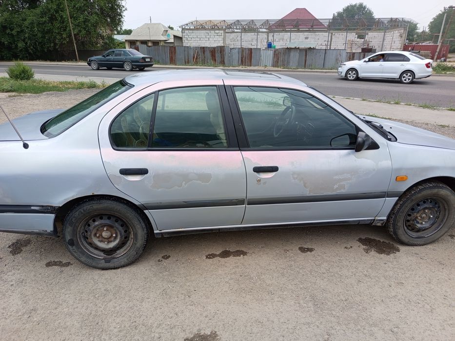 Ниссан примера 1992г.