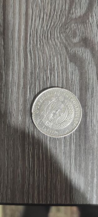 Танга монета 1999