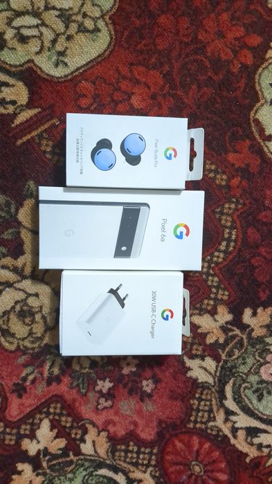 Google Pixel 6a + Google Pixel Buds Pro.