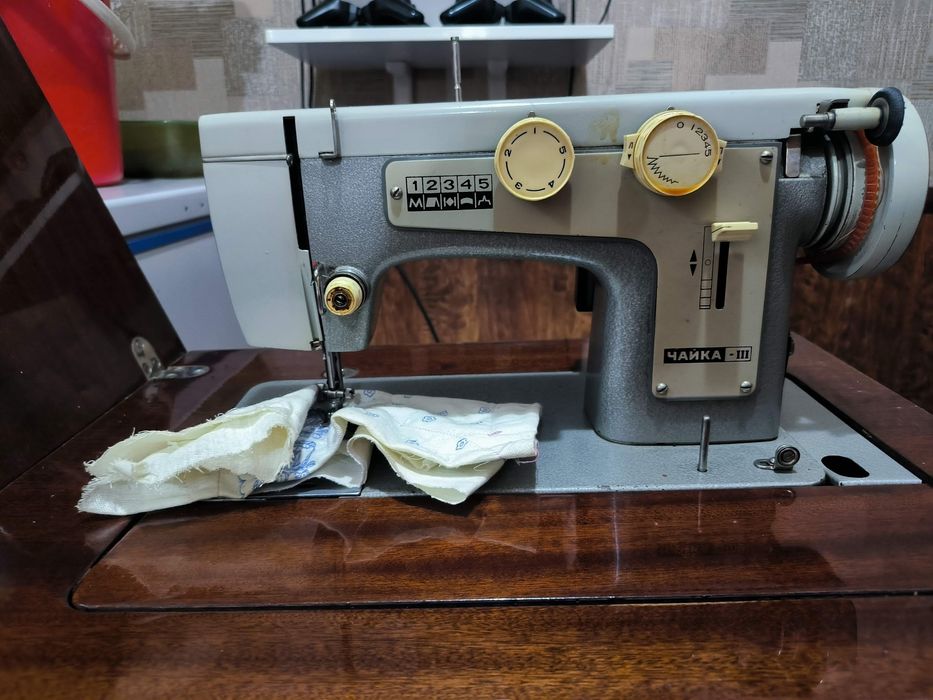 Швейная машина .