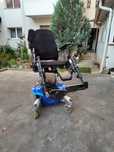 Cărucior electric pentru persoane cu dizabilități