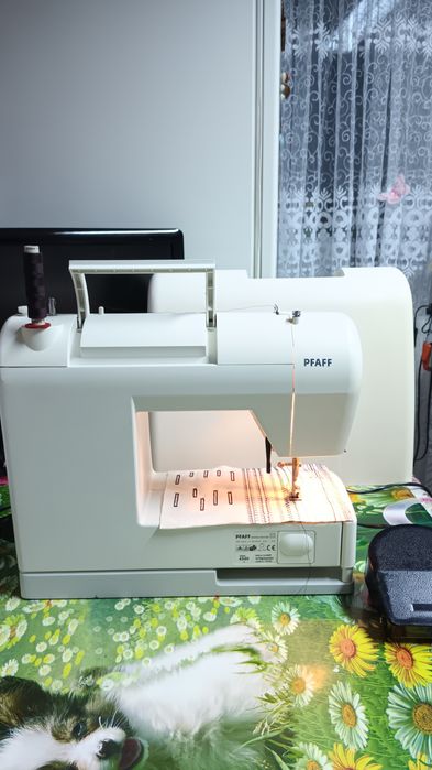 Masina de cusut PFAFF  4240 cu butoniera automata si multiple operatii