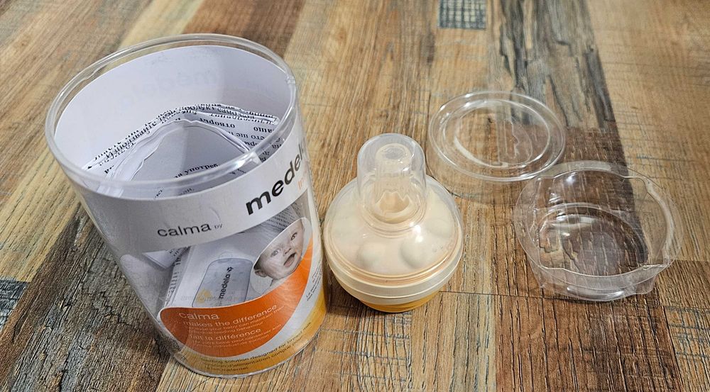 MEDELA SOLO двуфазна електрическа помпа + Подарък Medela Calma