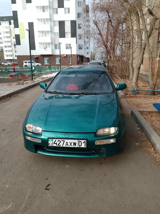 Автомобиль Мазда 323