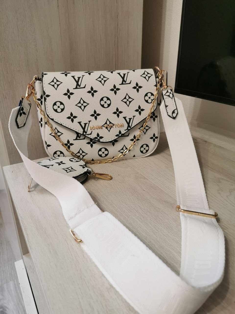 Geanta Louis Vuitton.