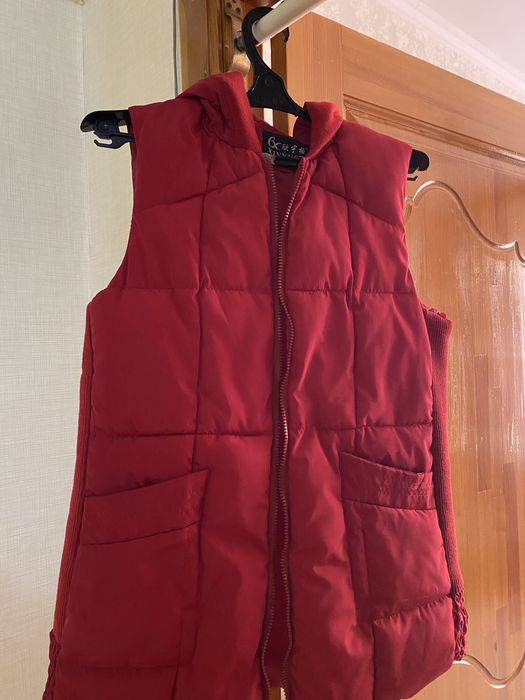 Балоневые жилеты женские