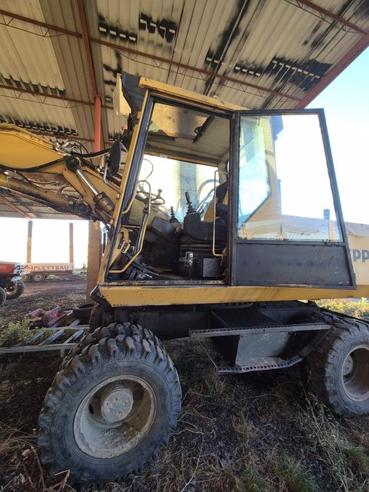 Excavator pe roți  zeppelin zm 15 t cat