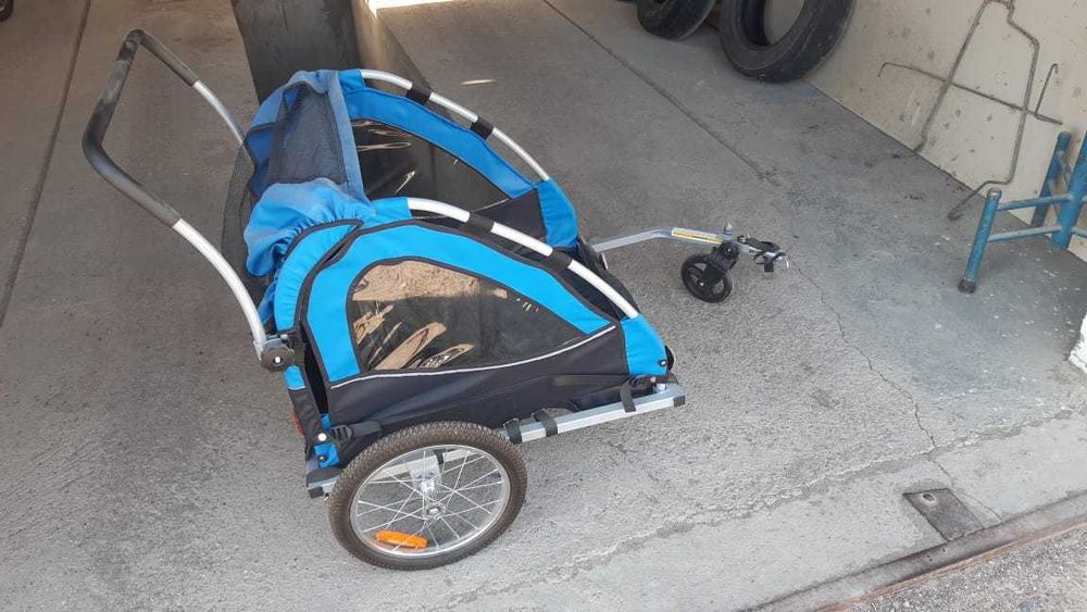 Детский прицеп для велосипеда