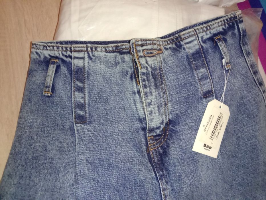 Брюки- джинсы новые