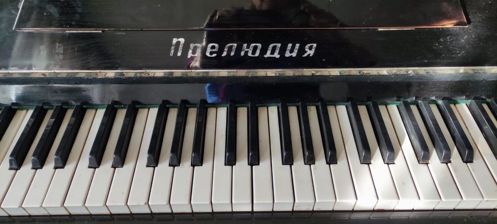 Отдам пианино черного цвета