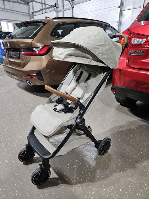Carucior ultracompact pentru bebelusi, cu pliere automata Nuna TRVL