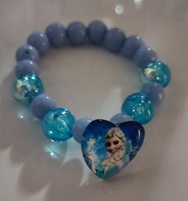 Рокля на Елза от Фроузън с два подаръка светещ ластик и корона