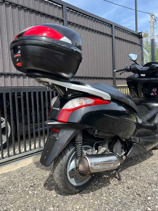 Honda S-wing 125 cc
RATE Fara Avans