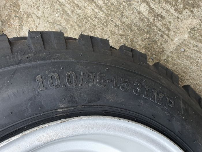 cauciucuri noi 10.0/75-15.3 montate pe janta noi de miguri MXYT