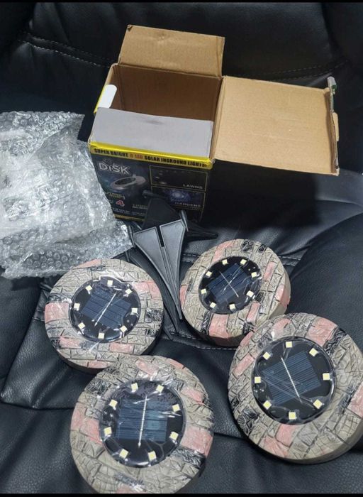 Set 4 lampi solare cu aspect de piatra cu 8 LED-uri