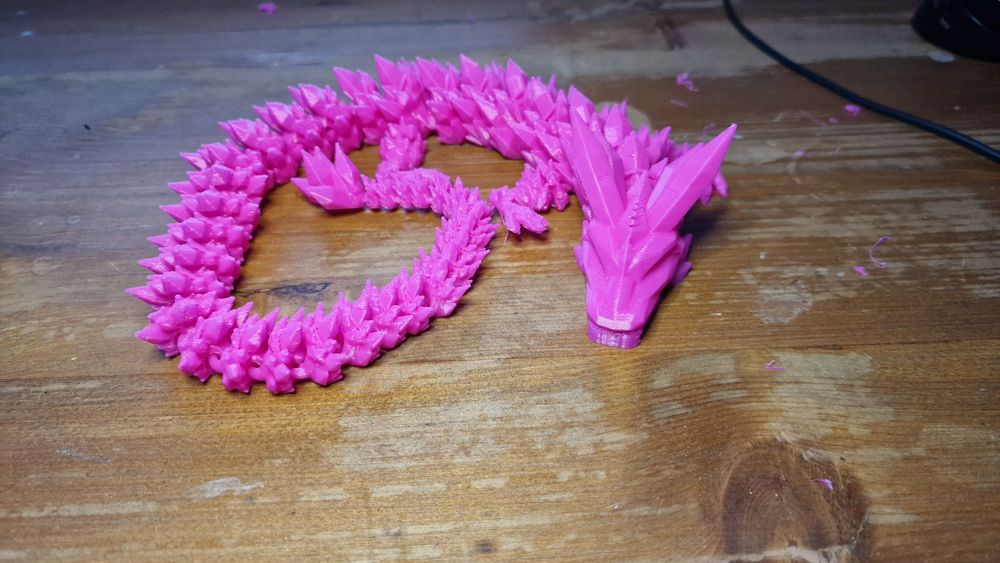 3D принтиран движещ се кристален дракон розов