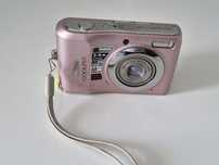 Aparat photo Nikon cu defect la capacul de la baterii