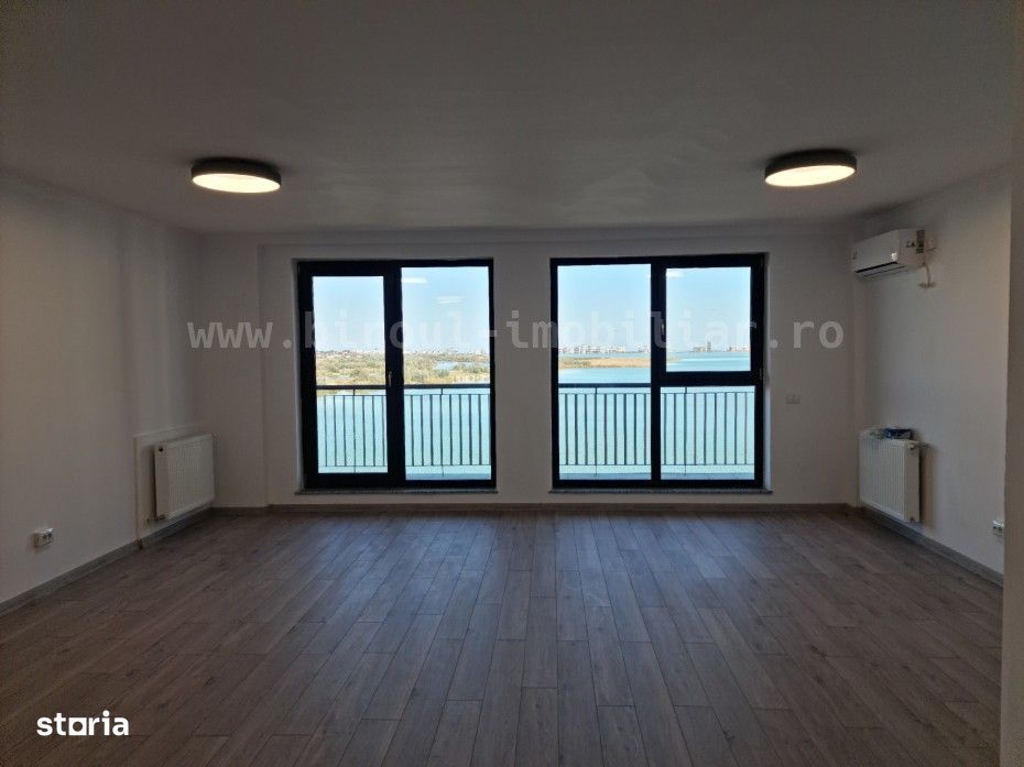 TVA REDUS -Apartament cu Vedere Frontală la Lac, Parcare - 0% Comision