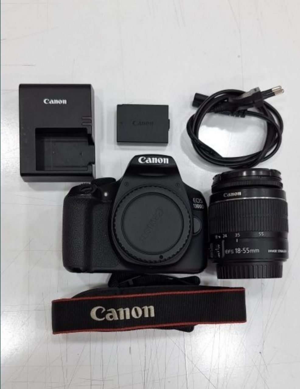 Canon 1300 D Xolati yangi