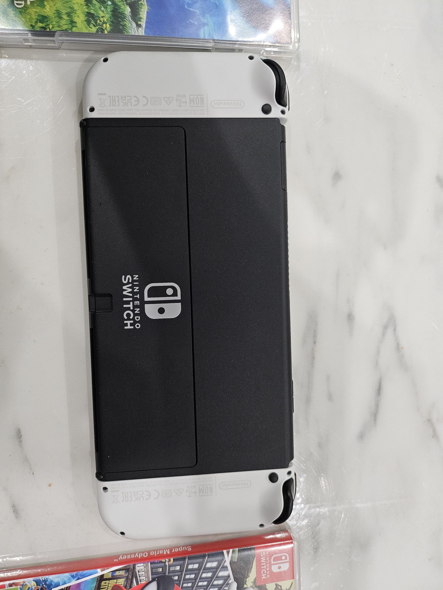Nintendo switch OLED новый с играми