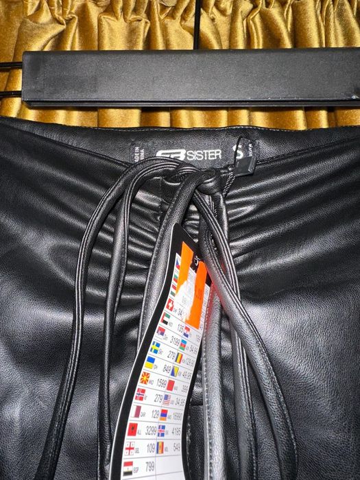 Pantaloni Piele ecologică New Yorker evazați negri