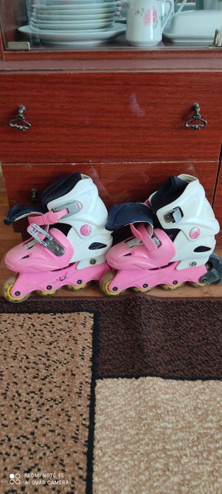 Роликовые коньки б/у
