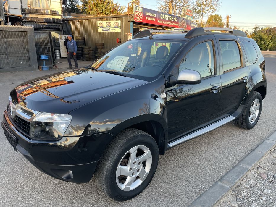 Dacia Duster benzina 1.6 110 cai tractiune 4x4 model prestige