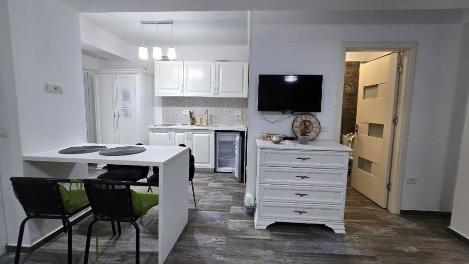 Garsonieră  Ștefan Building Resort cu curte proprie