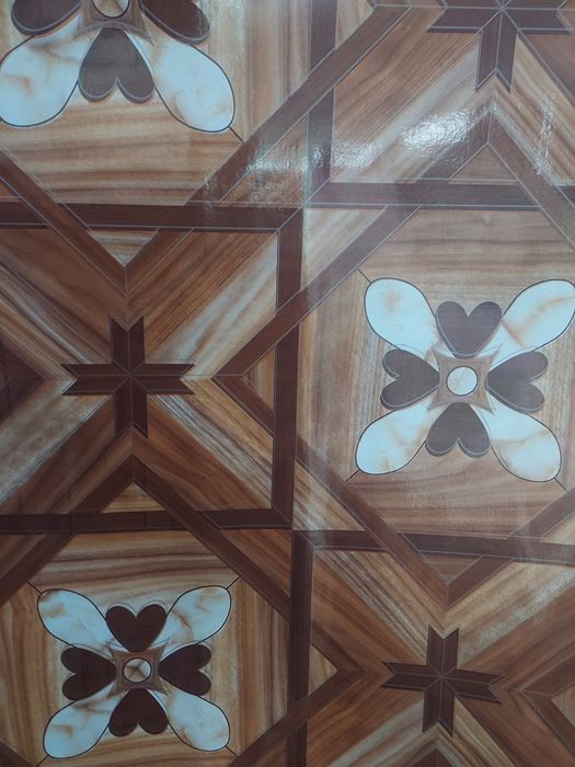 Linoleu model floare maron 519lei, floare gri549 lei 2x20 m rola