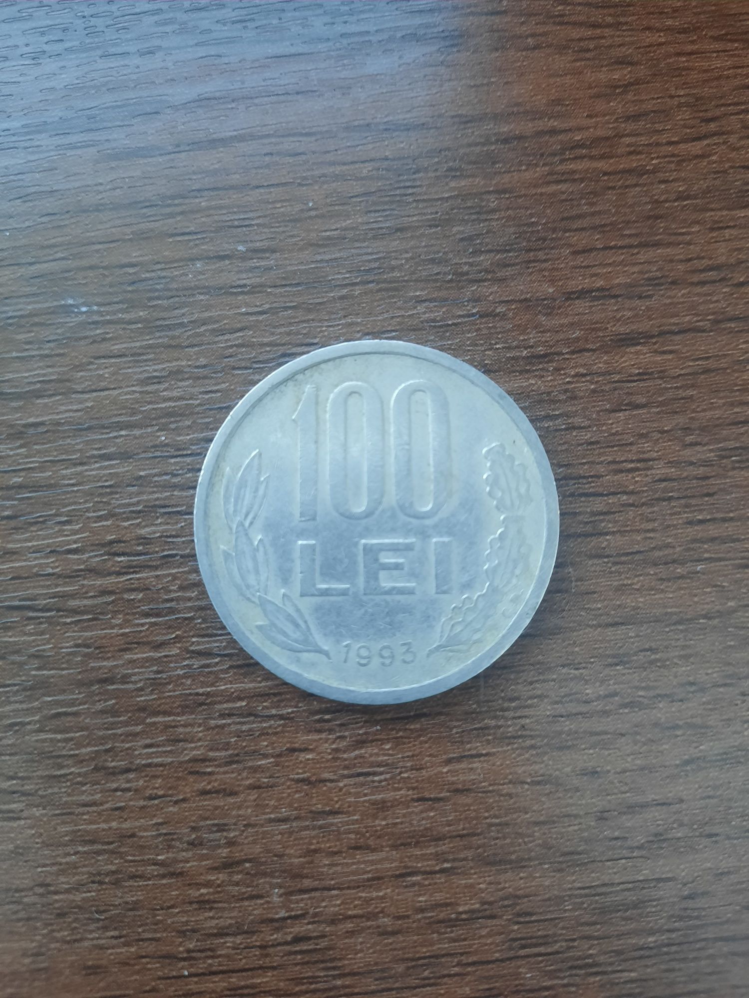 Vând moneda de 100 lei