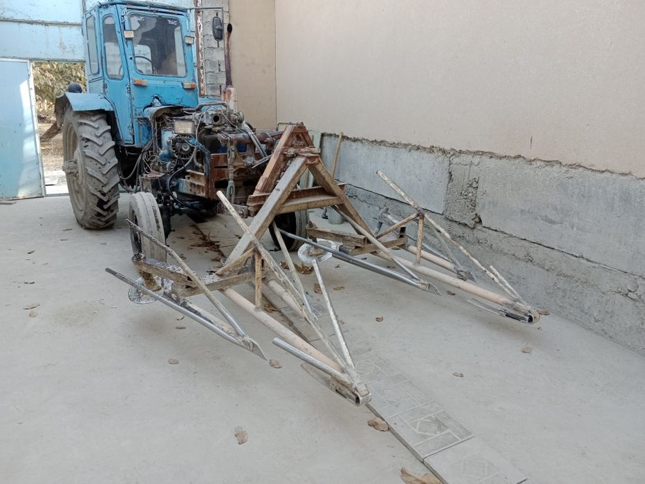 Traktor sotiladi barcha agregatlari bilan birga puli tel orqali gapl