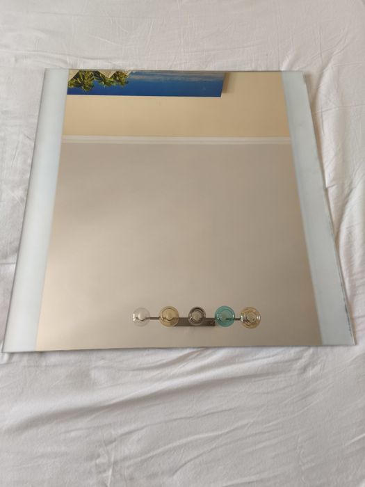 Стенно огледало .