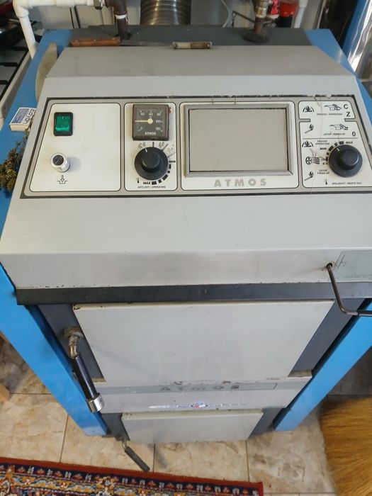 Vînd centrala Atmos pe lemne 35kw