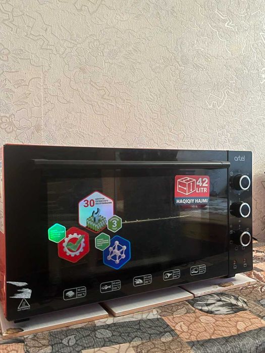 Продам электрическая духовка (artel)